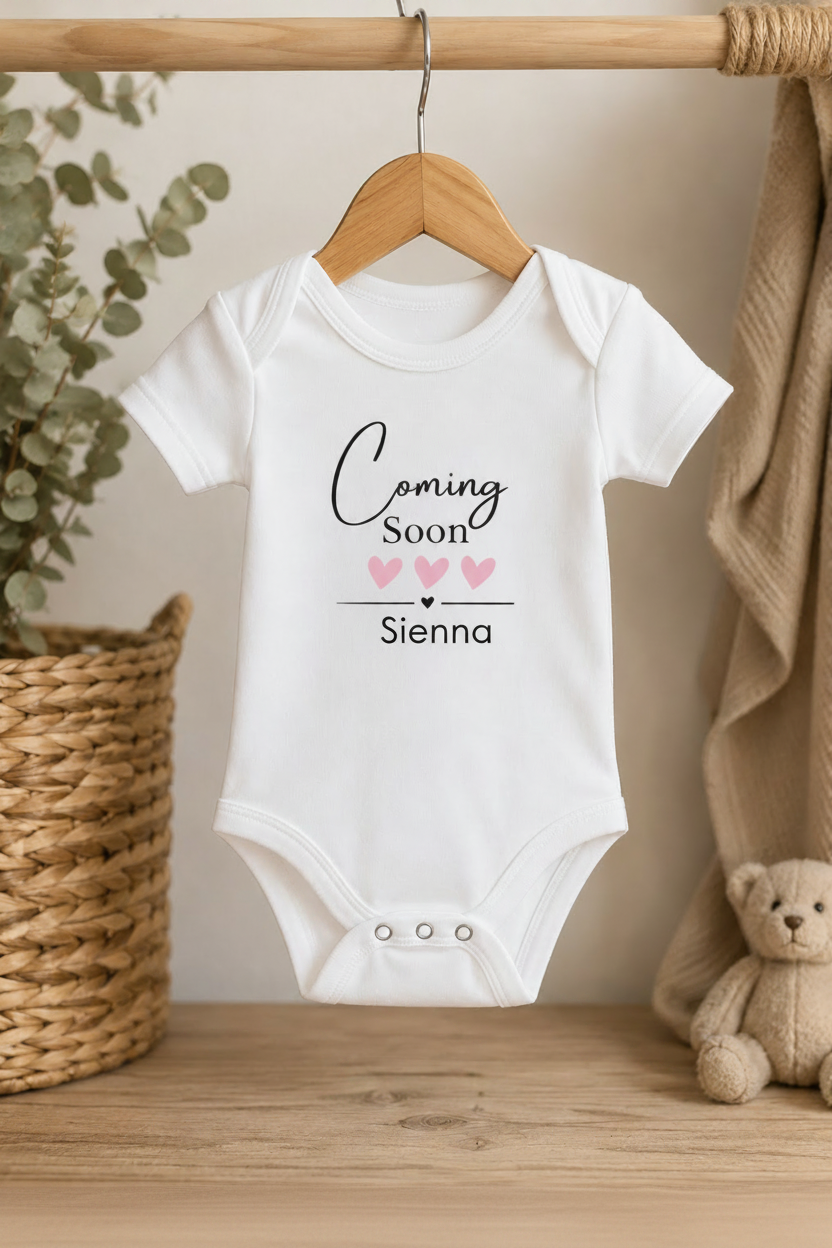 Coming Soon Babygrow with Pink Hearts